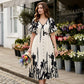 🥳NEUHEITEN FÜR 2026 – 50% RABATT🎉 Damen-Midikleid mit botanischem Print – V-Ausschnitt, A-Linie und Volantärmel🌿