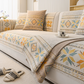 Rutschfester Sofaauflagenbezug aus Chenille im Boho-Stil